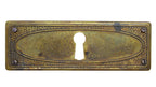 Schlüsselblatt Regency Oval Messing Antik
