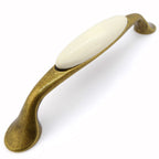 Landhausstil Bogengriffe mit Porzellan-Inlay creme Florence