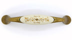 Landhausstil Bogengriffe mit Porzellan-Inlay creme mit Goldmuster