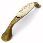 Landhausstil Bogengriffe mit Porzellan-Inlay creme mit Goldmuster
